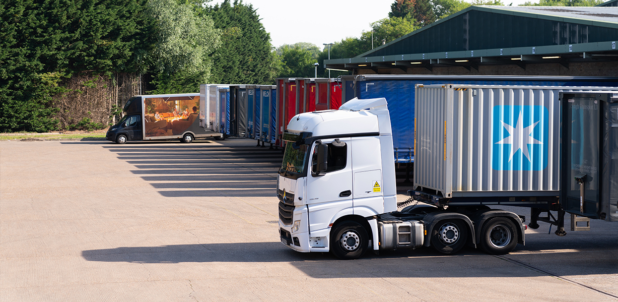 Several White Stores lorries being loaded at the Cambridge warehouse.